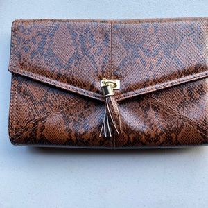 Brown animal print clutch.